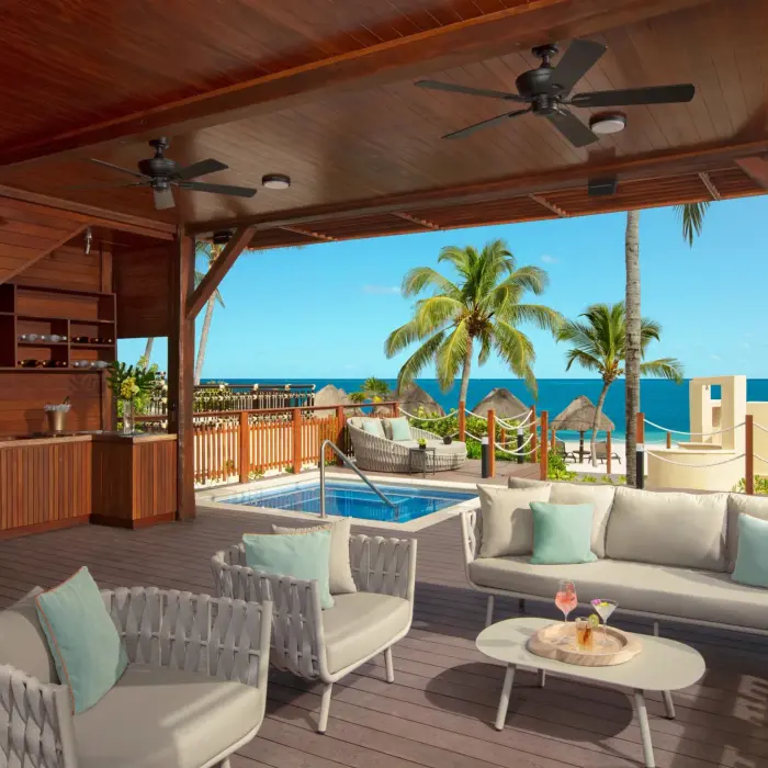 Two-story beach cabana with upper sun deck, plunge pool and lounge space.