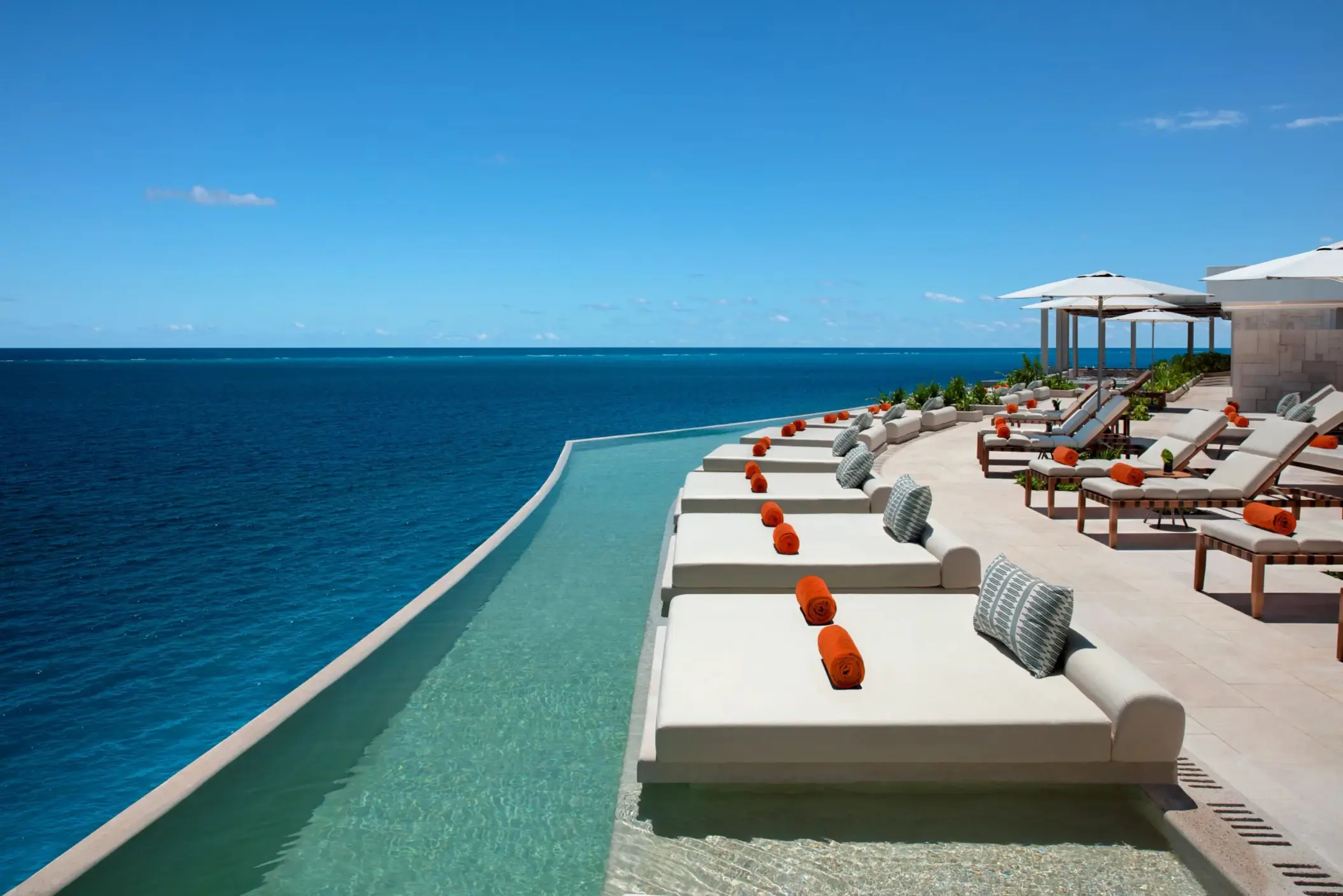 Chic rooftop lounge with panoramic views at Dreams Sapphire Resort & Spa, perfect for cocktails and stargazing.
