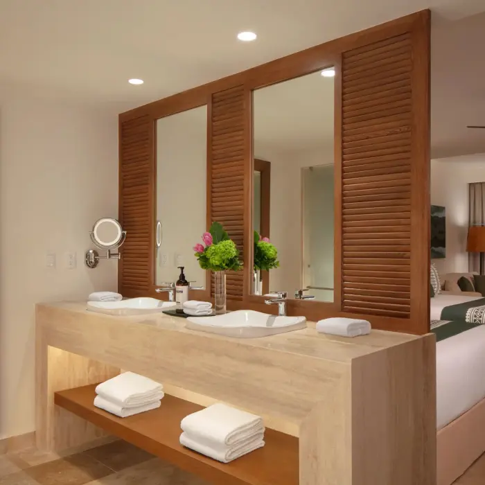 Modern bathroom with double vanities in the stylish Junior Suite.