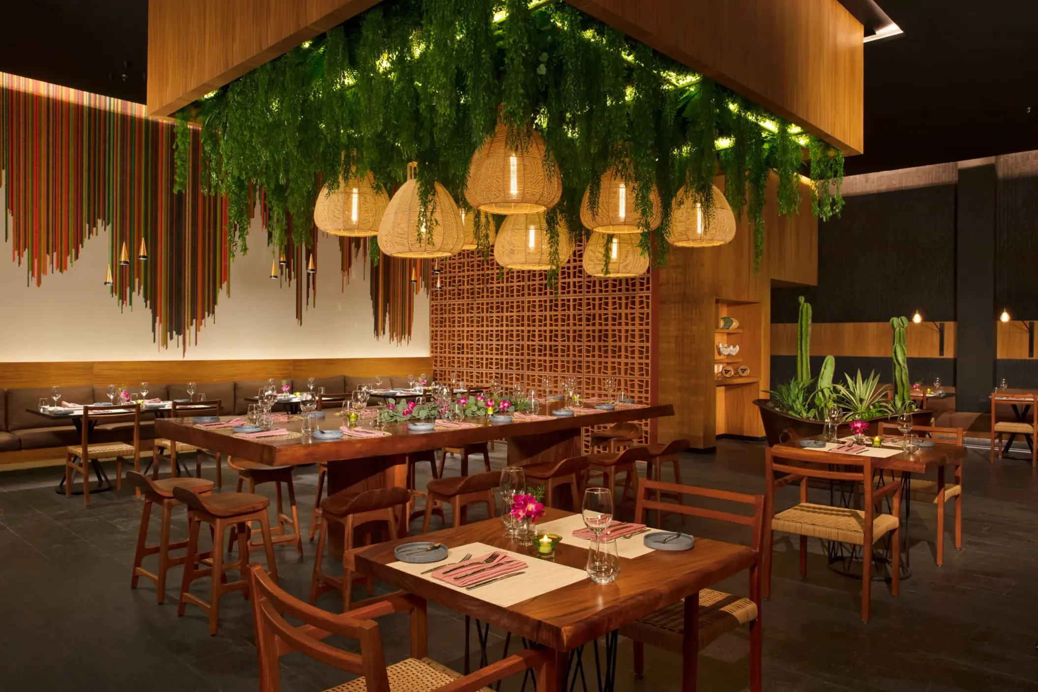 Mi Lucrecia restaurant with Mexican decor, warm lighting, and traditional design touches.