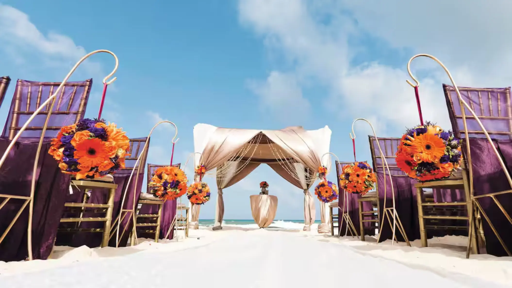 beach wedding setup at El Dorado Casitas Royale