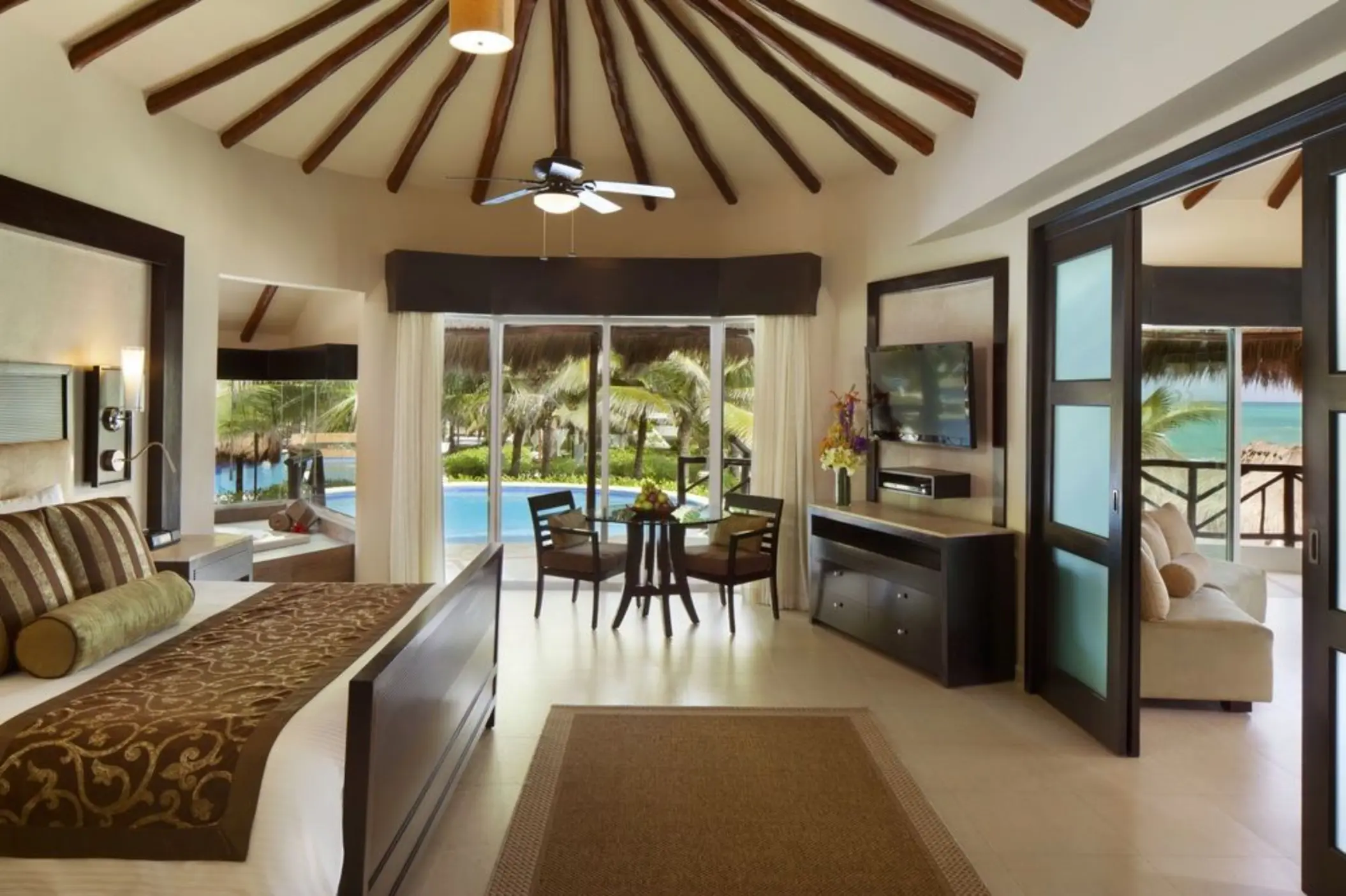 casita at El Dorado Casitas Royale with king bed and views of the pool and sea