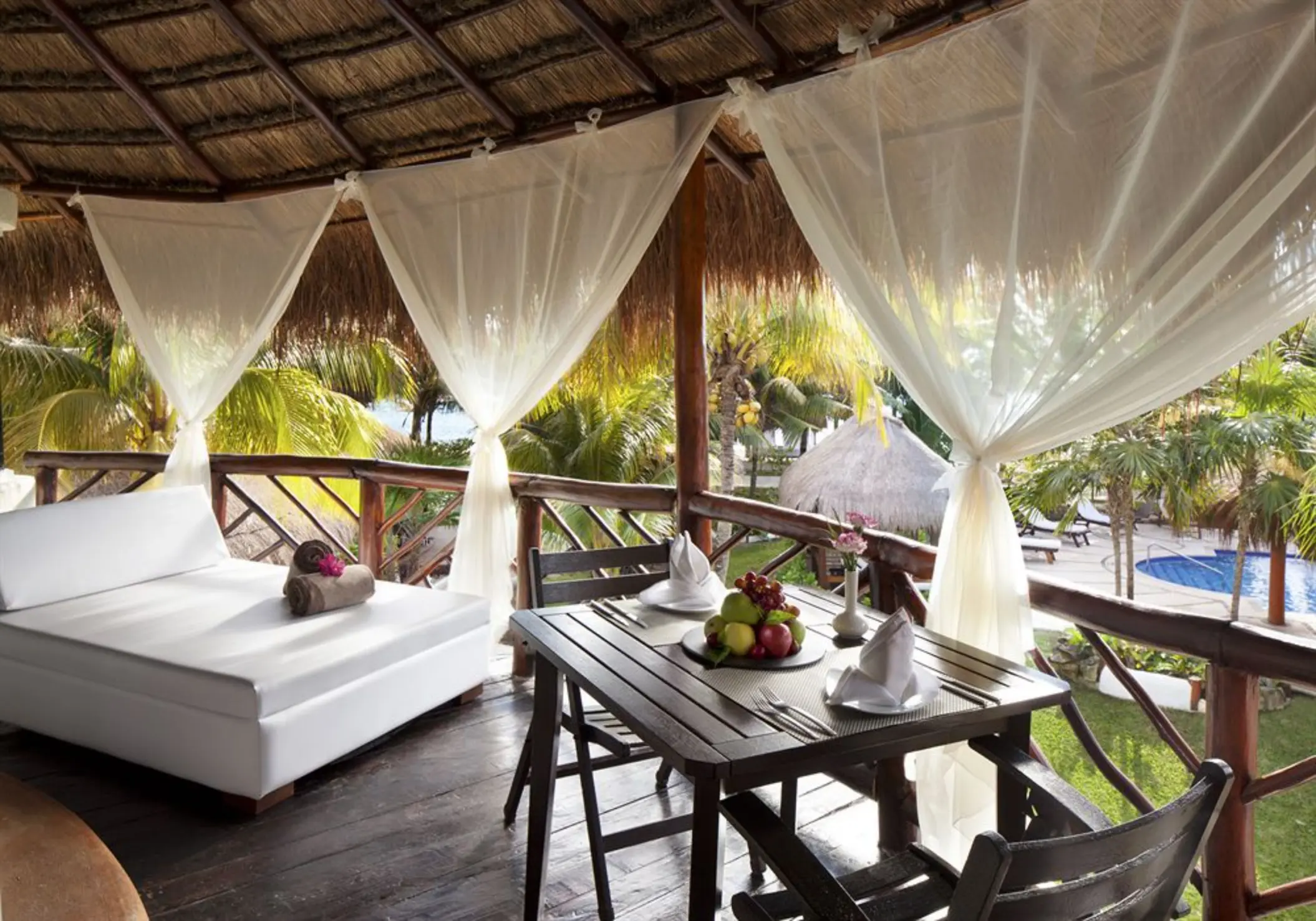 casita balcony with view of the pool at El Dorado Casitas Royale