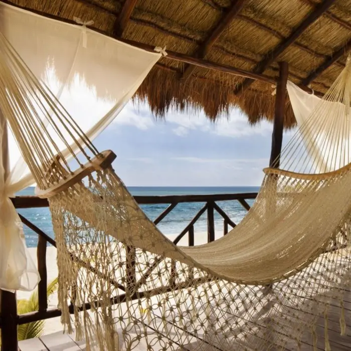 hammock in the balcony with views of the sea at El Dorado Casitas Royale