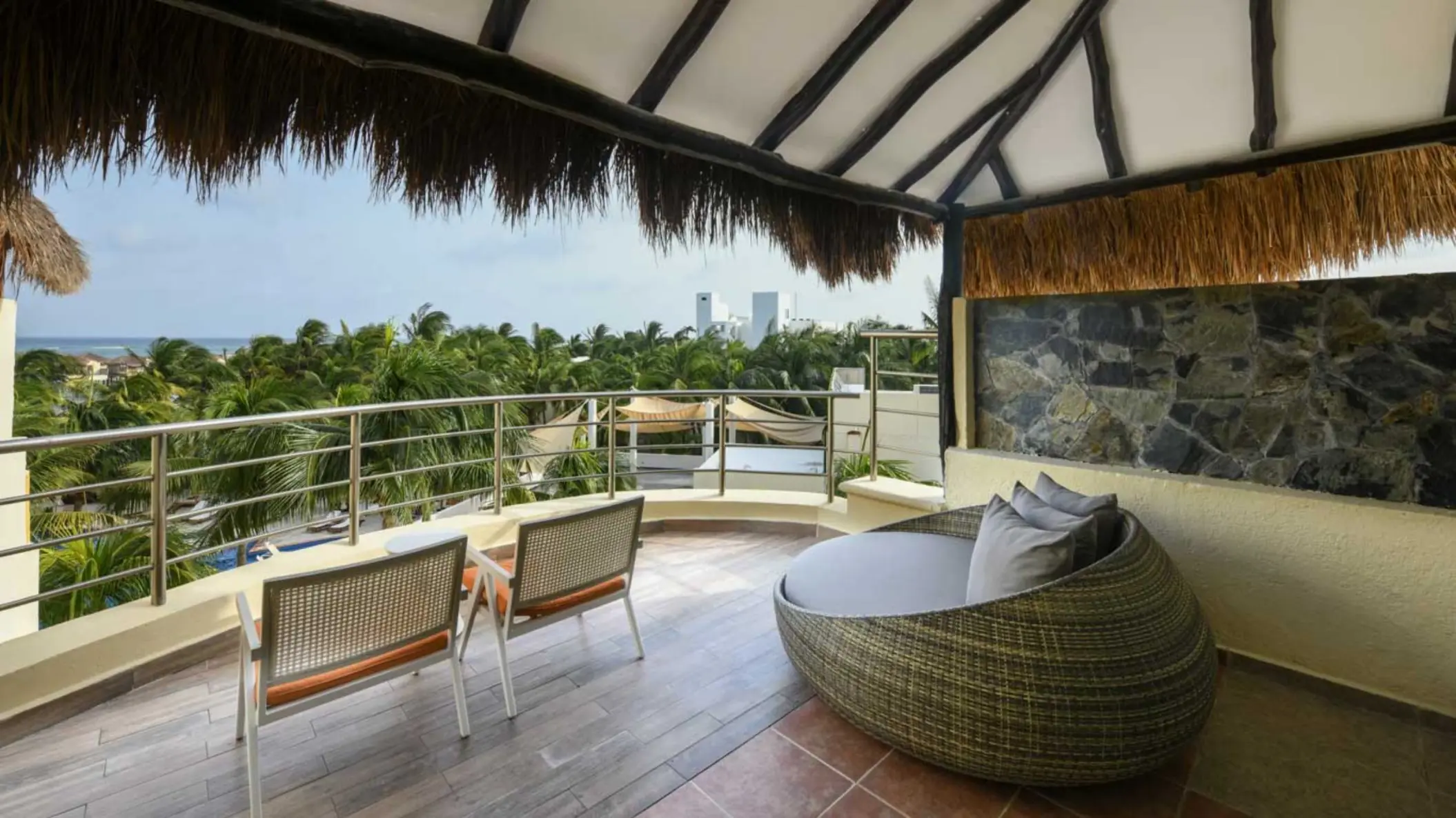 balcony of ocean view suite at El Dorado Maroma