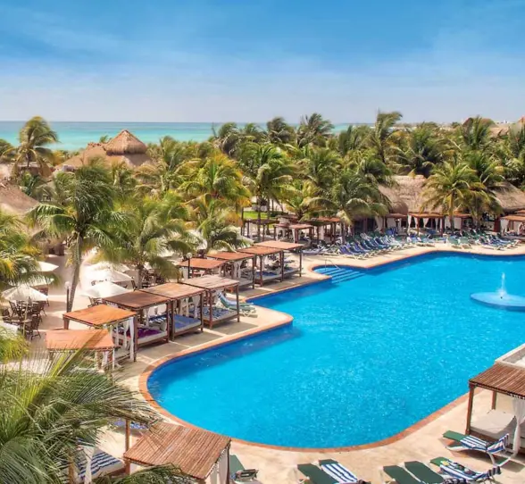 aerial view of the pool and cabanas and loungers at El Dorado Royale
