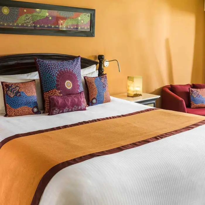 suite with king bed at El Dorado Royale