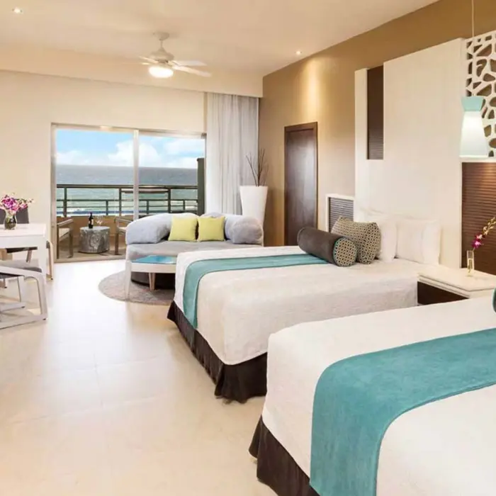 oceanview suite with two beds at El Dorado Seaside Suites