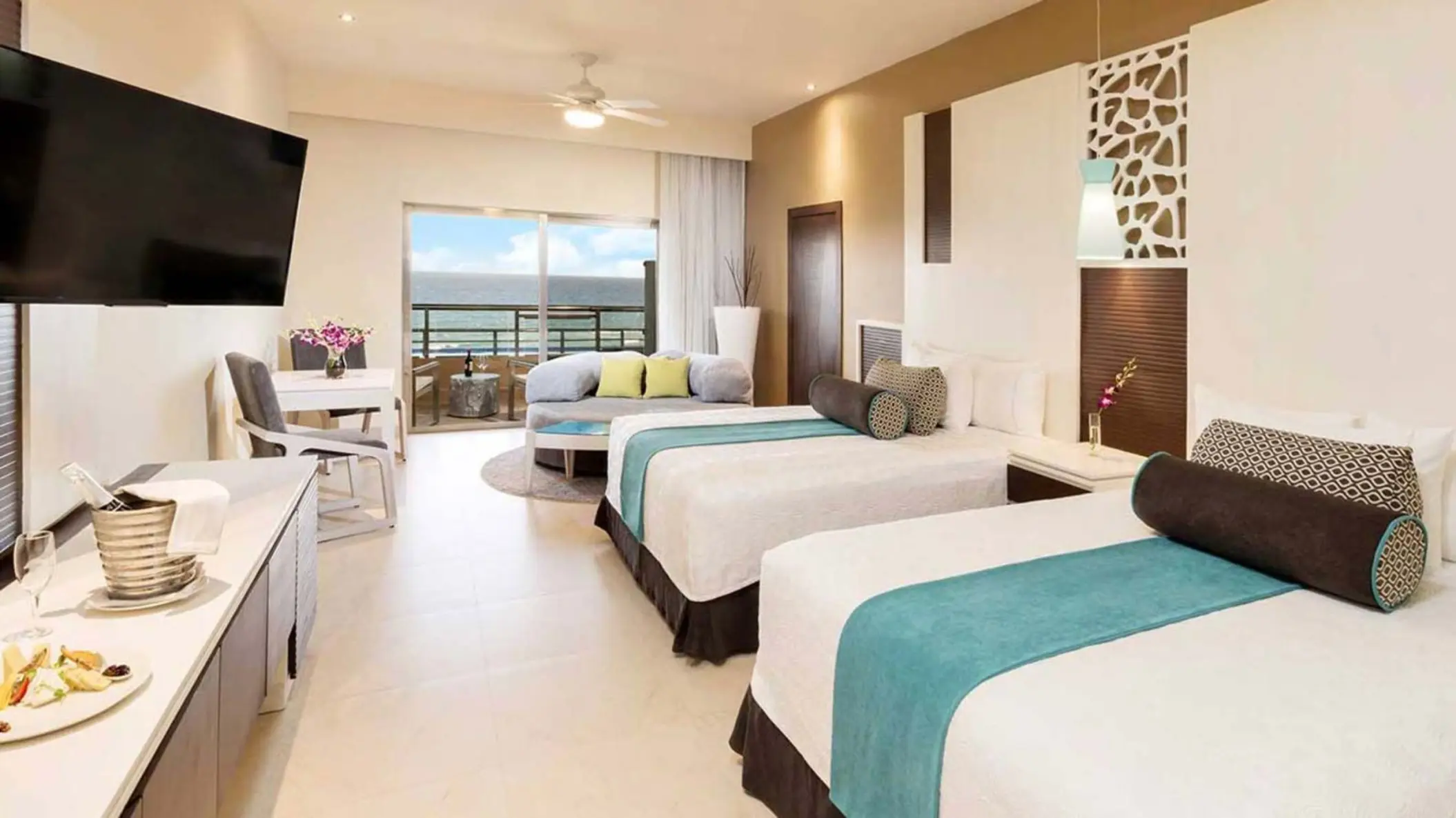 oceanview suite with two beds at El Dorado Seaside Suites