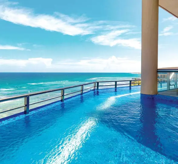 swim out pool with sea view at El Dorado Seaside Suites