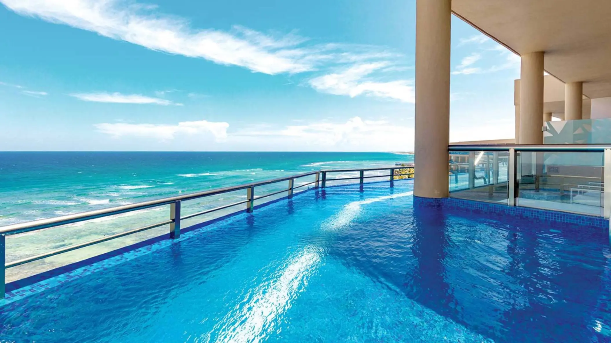 swim out pool with sea view at El Dorado Seaside Suites