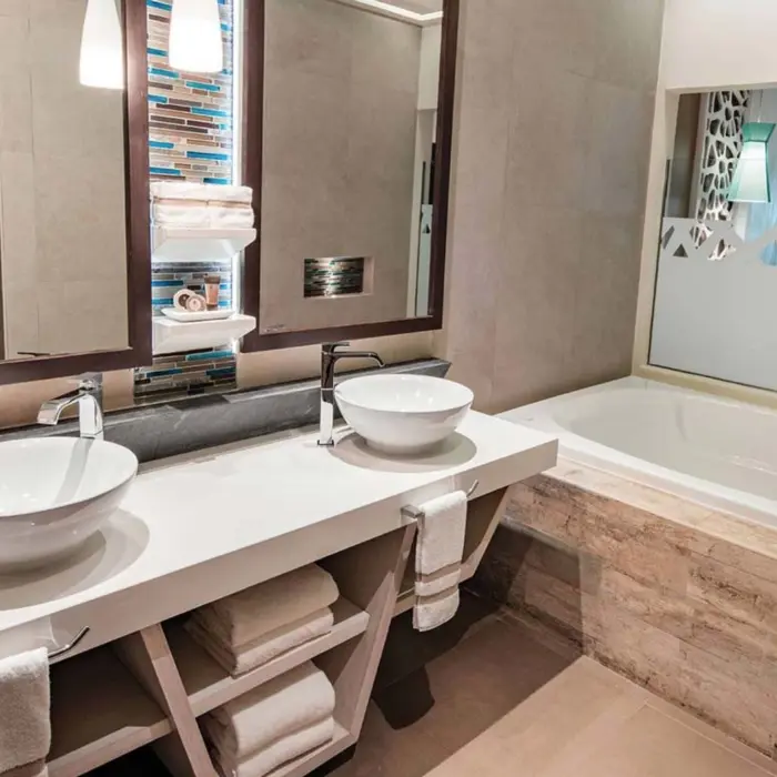 washroom with tub of suite at El Dorado Seaside Suites