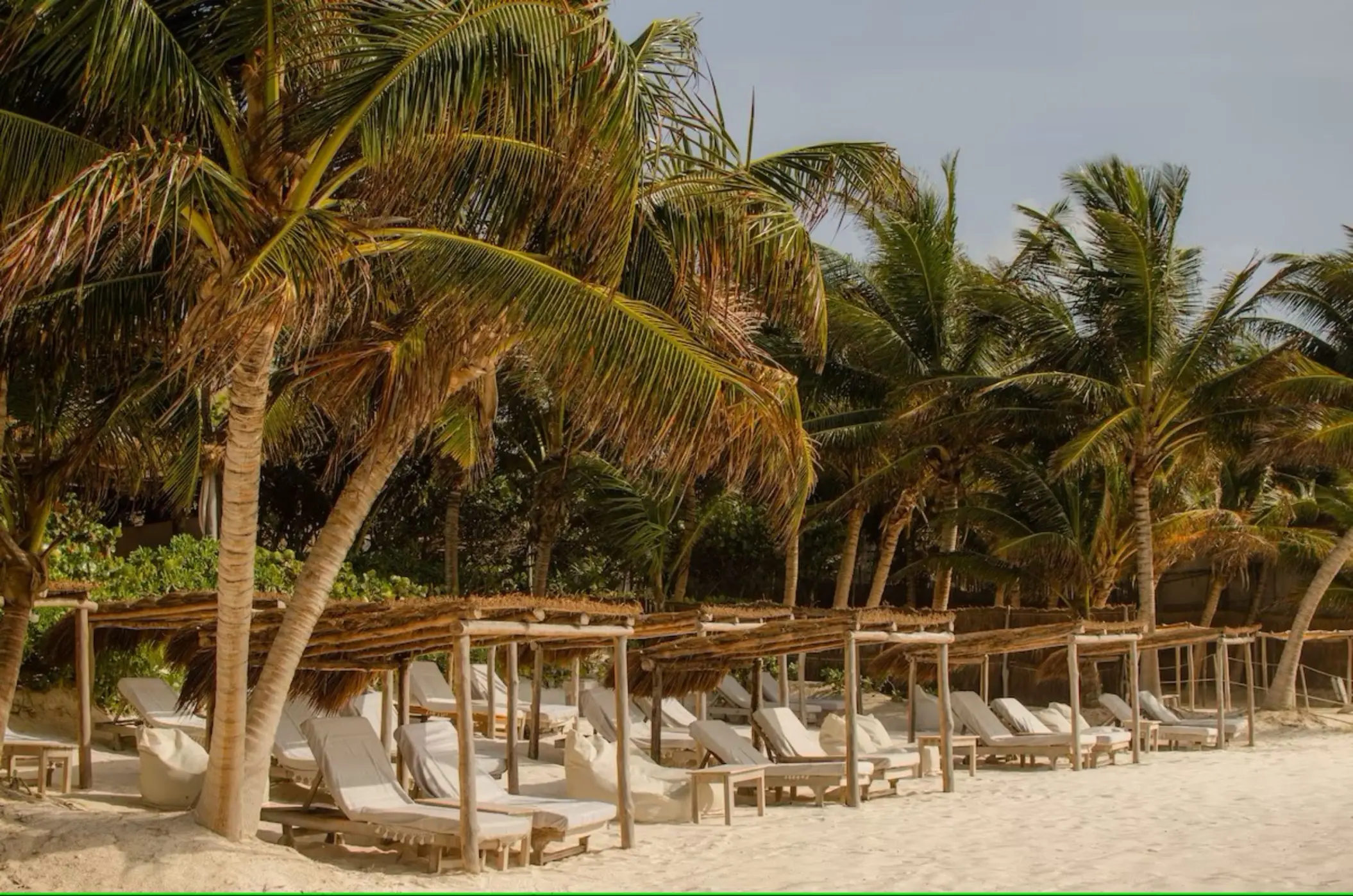 bali beds on the beach at Encantada Tulum