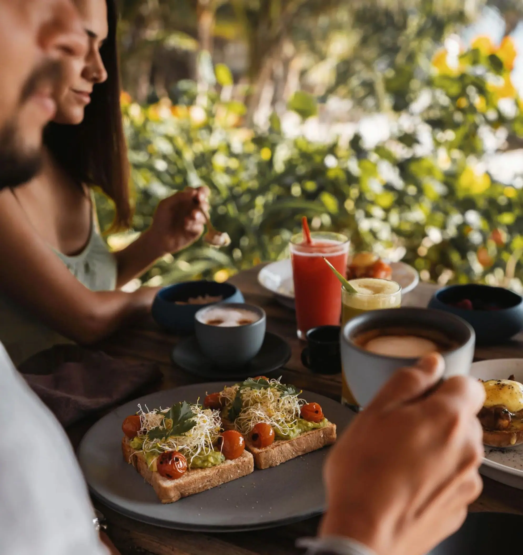 couple having breakfast at Encantada Tulum