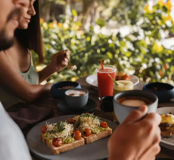 couple having breakfast at Encantada Tulum