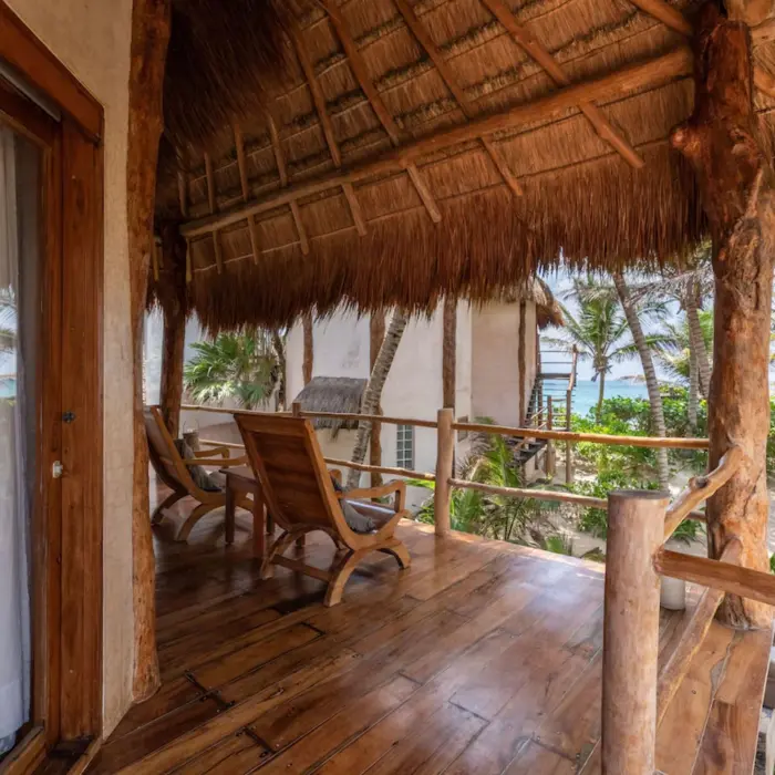 patio of suite with partial ocean view at Encantada Tulum