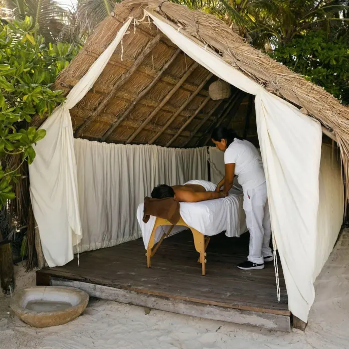 soothing massage on the beach at Encantada Tulum