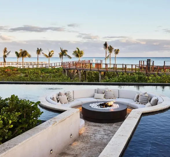Etereo Riviera Maya fire pit in the pool