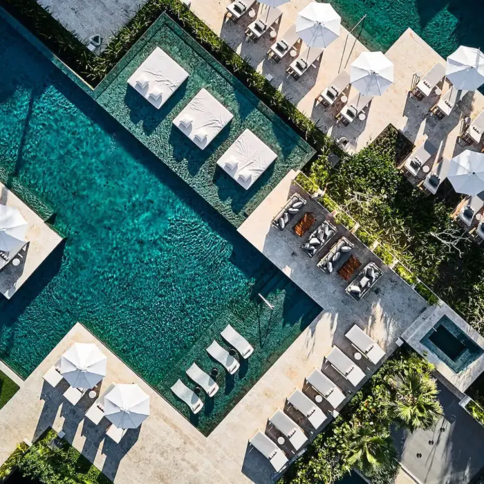 top view of the pools and loungers at Etereo Riviera Maya