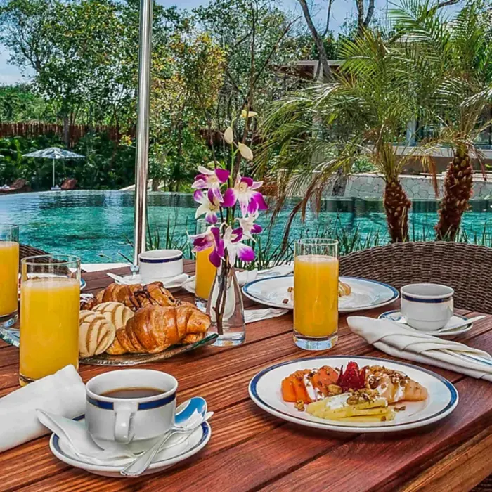delicious breakfast by the pool at Fairmont Heritage Place Mayakoba