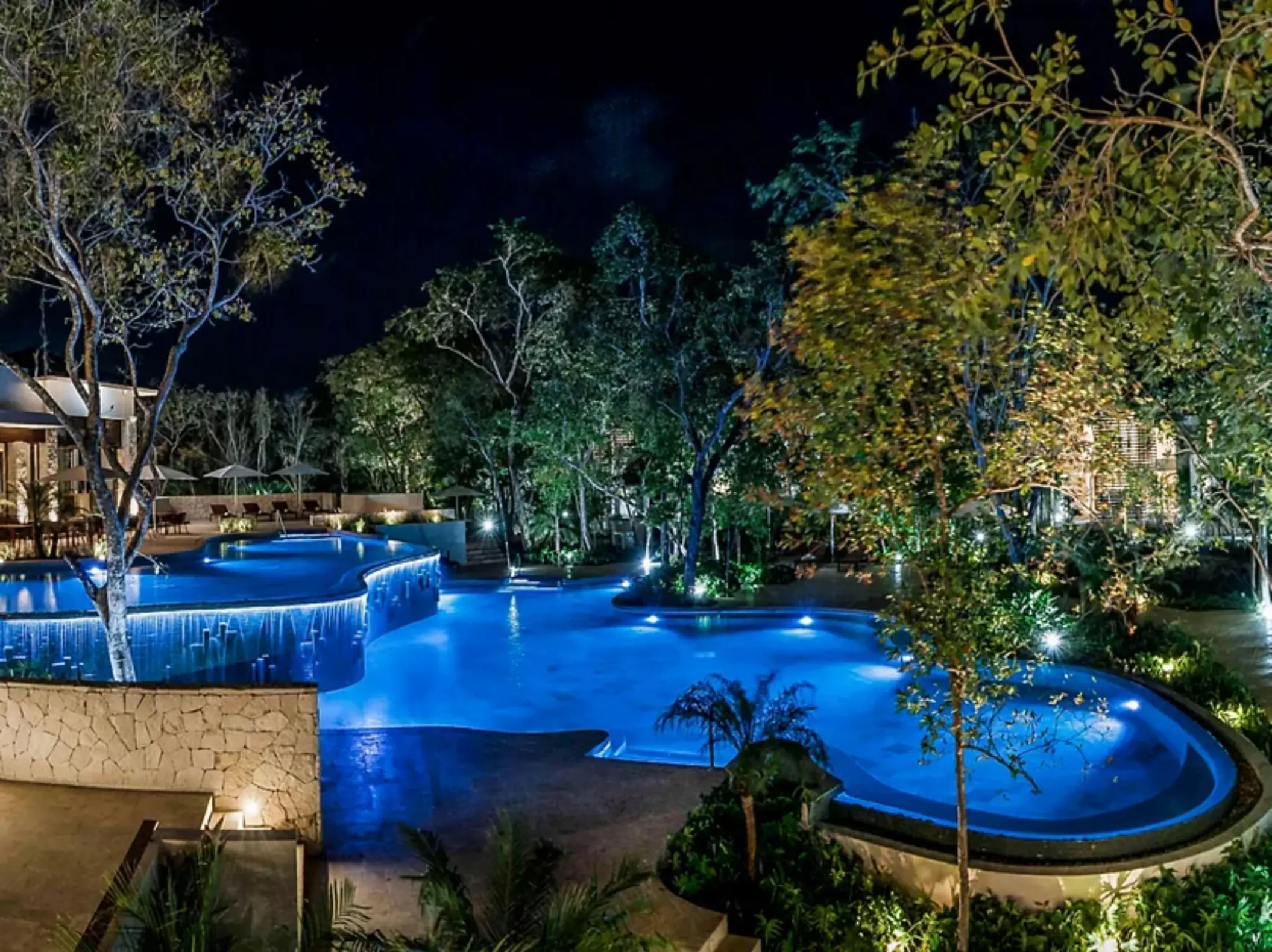 pool at night at Fairmont Heritage Place Mayakoba