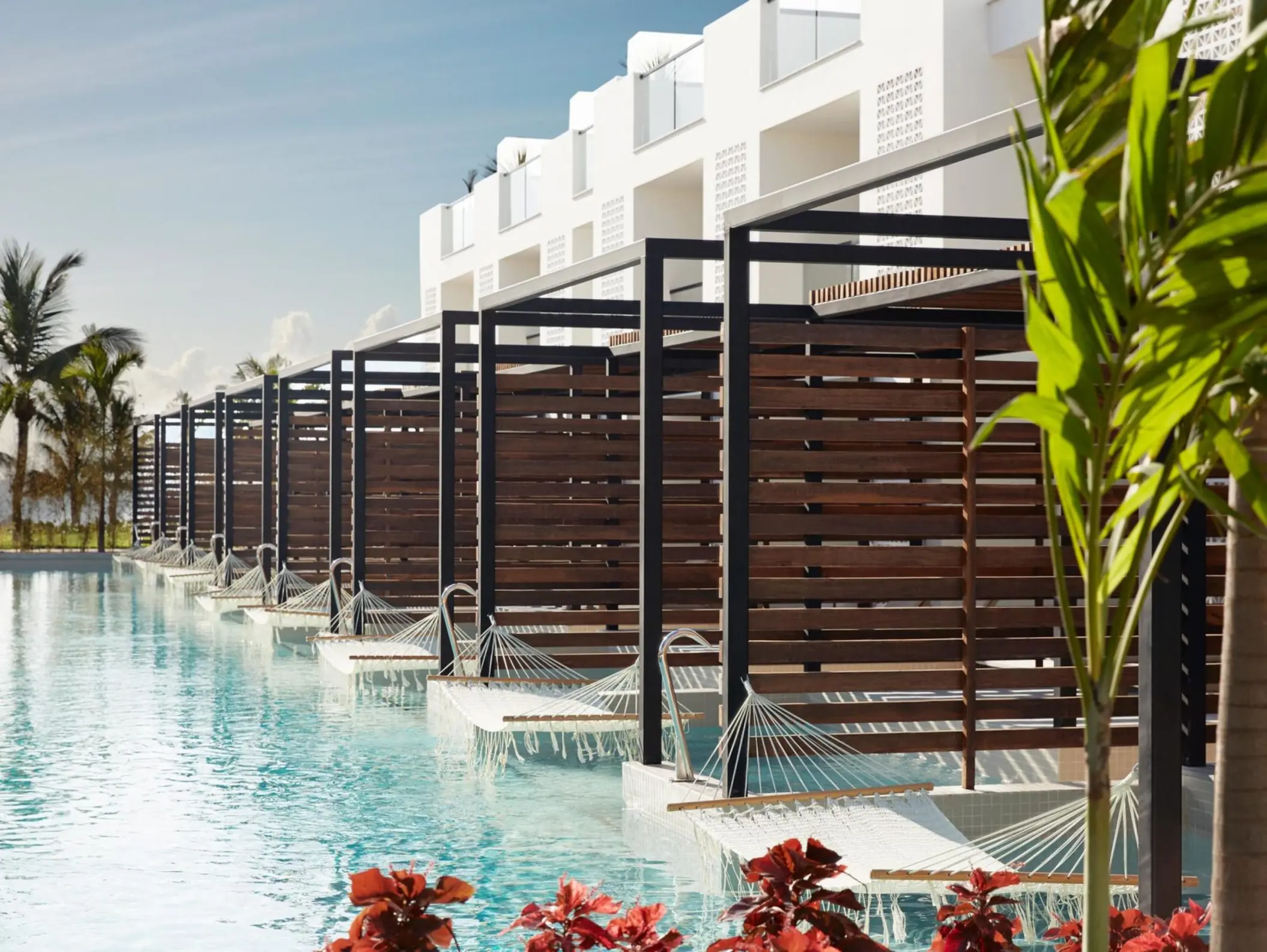 exterior of swim up suites at finest playa mujeres