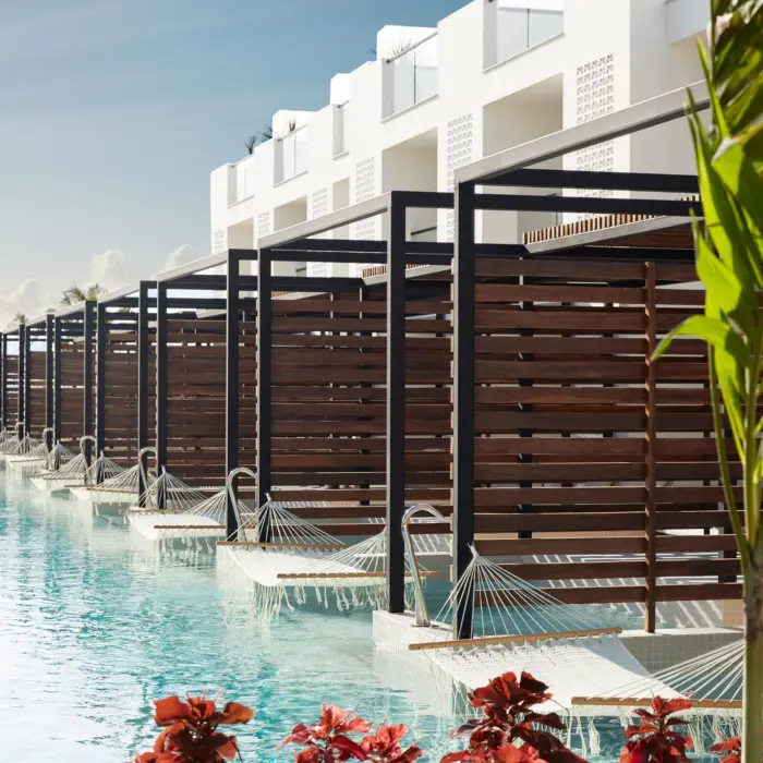 exterior of swim up suites at finest playa mujeres