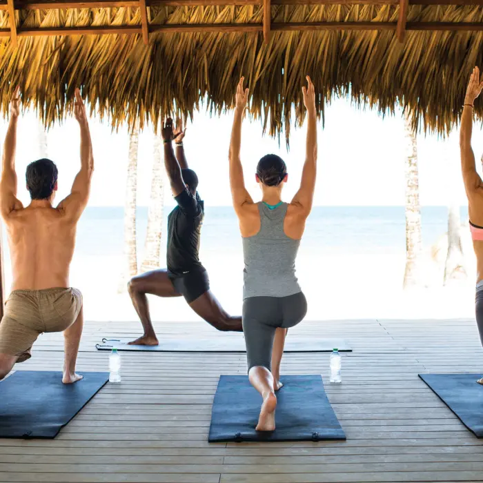 yoga on the beach at finest playa mujeres