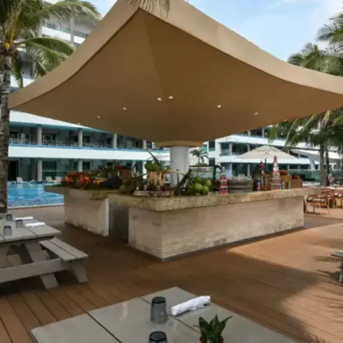 outdoor poolside eatery and bar at Generations Riviera Maya Resort