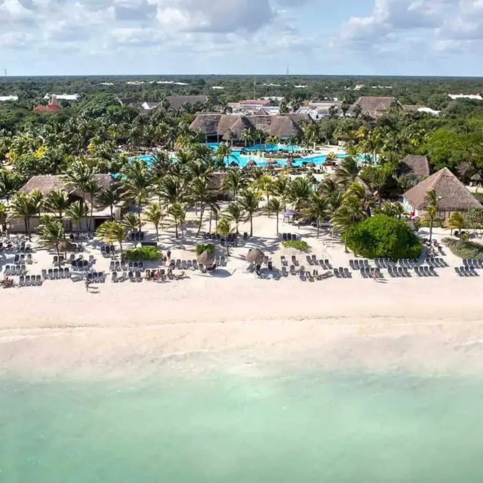 aerial view of Grand Palladium Colonial with its pools and buildings and beach