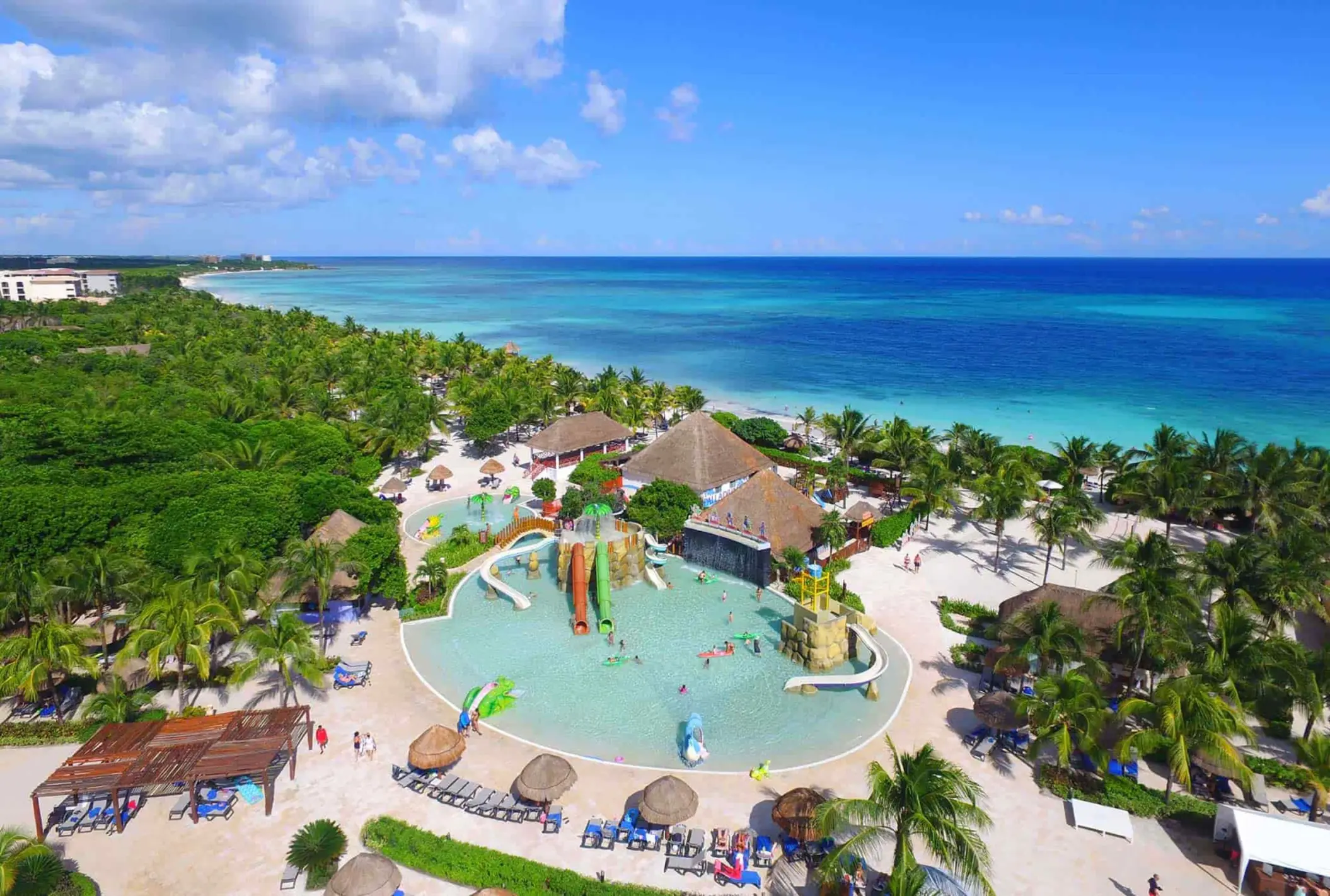 aerial view of the pool and kids water park and beach at grand palladium kantenah