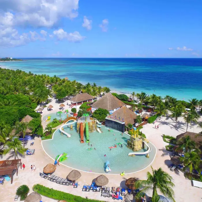 aerial view of the pool and kids water park and beach at grand palladium kantenah