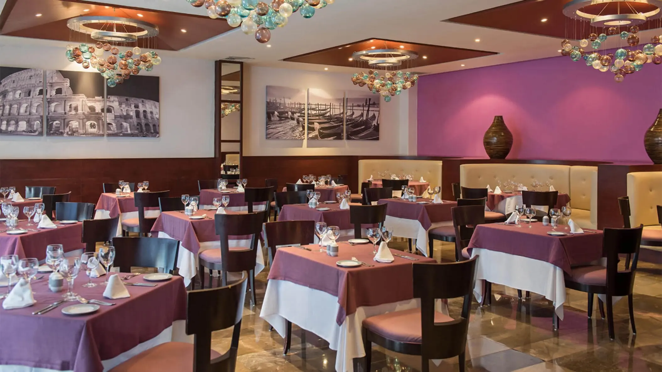 Mamma Mia restaurant at Grand Riviera Princess with tables set for dining and charming Italian-themed decor.