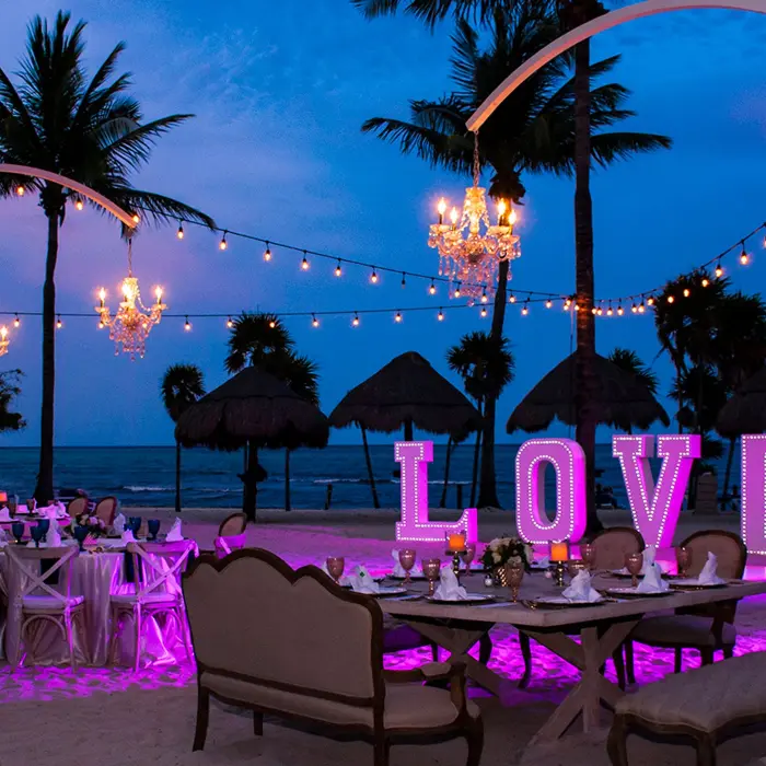 Romantic beach wedding reception at Grand Sunset Princess with 