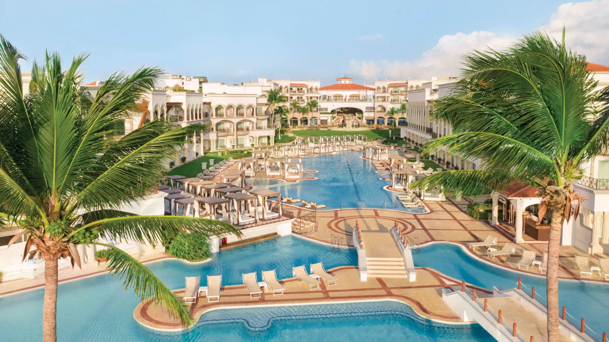 aerial view of the pools and resort buildings at Hilton Playa del Carmen