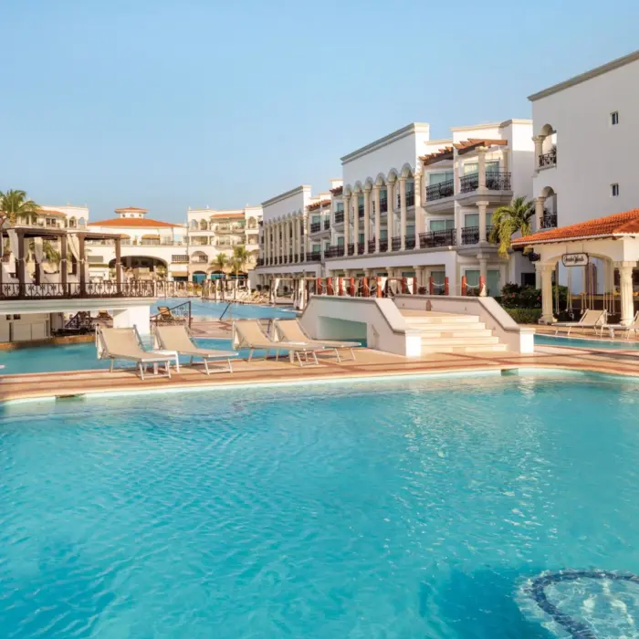 pool and resort buildings at Hilton Playa del Carmen