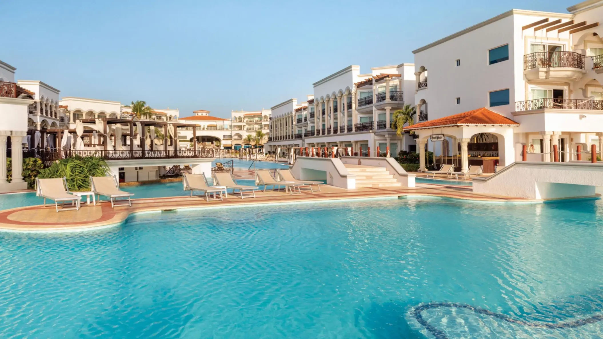 pool and resort buildings at Hilton Playa del Carmen
