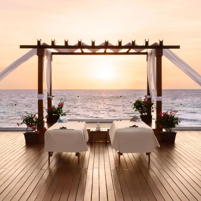Seaside Palapas Couples Massage setup at Hilton Playa del Carmen