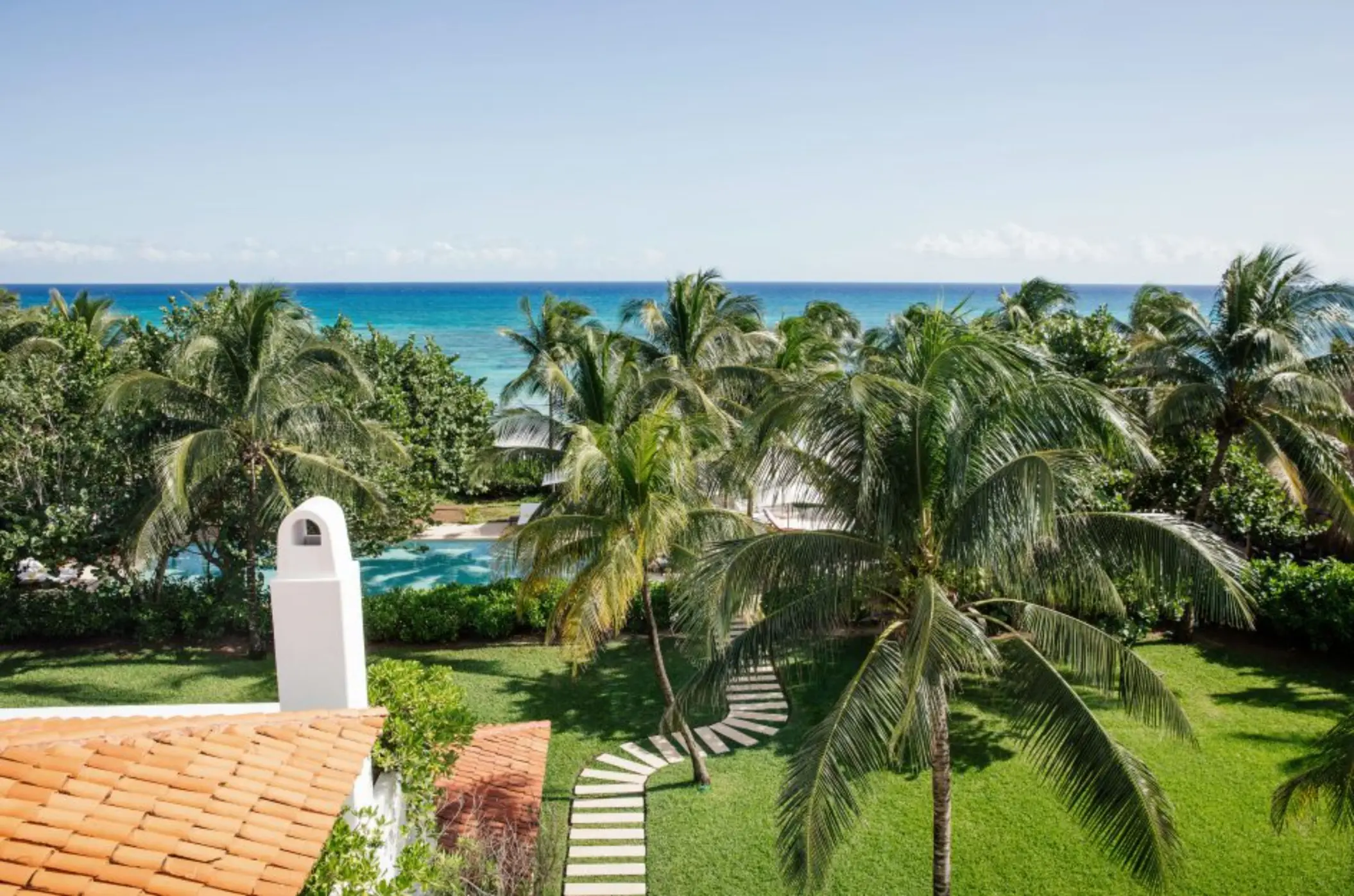 landscaped gardens and pathways with ocean views at Hotel Esencia