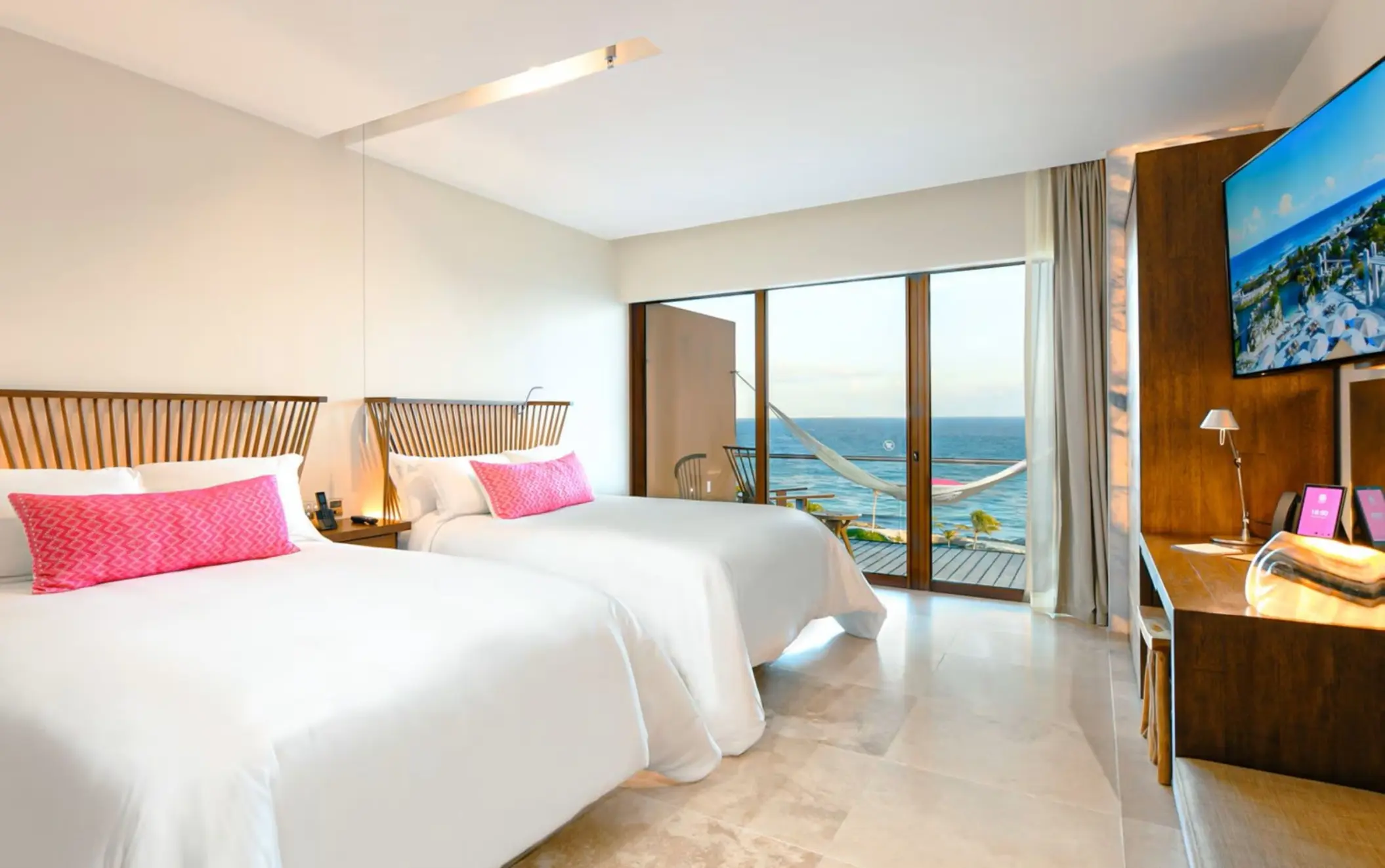 oceanfront suite with two double beds at Hotel Xcaret Mexico