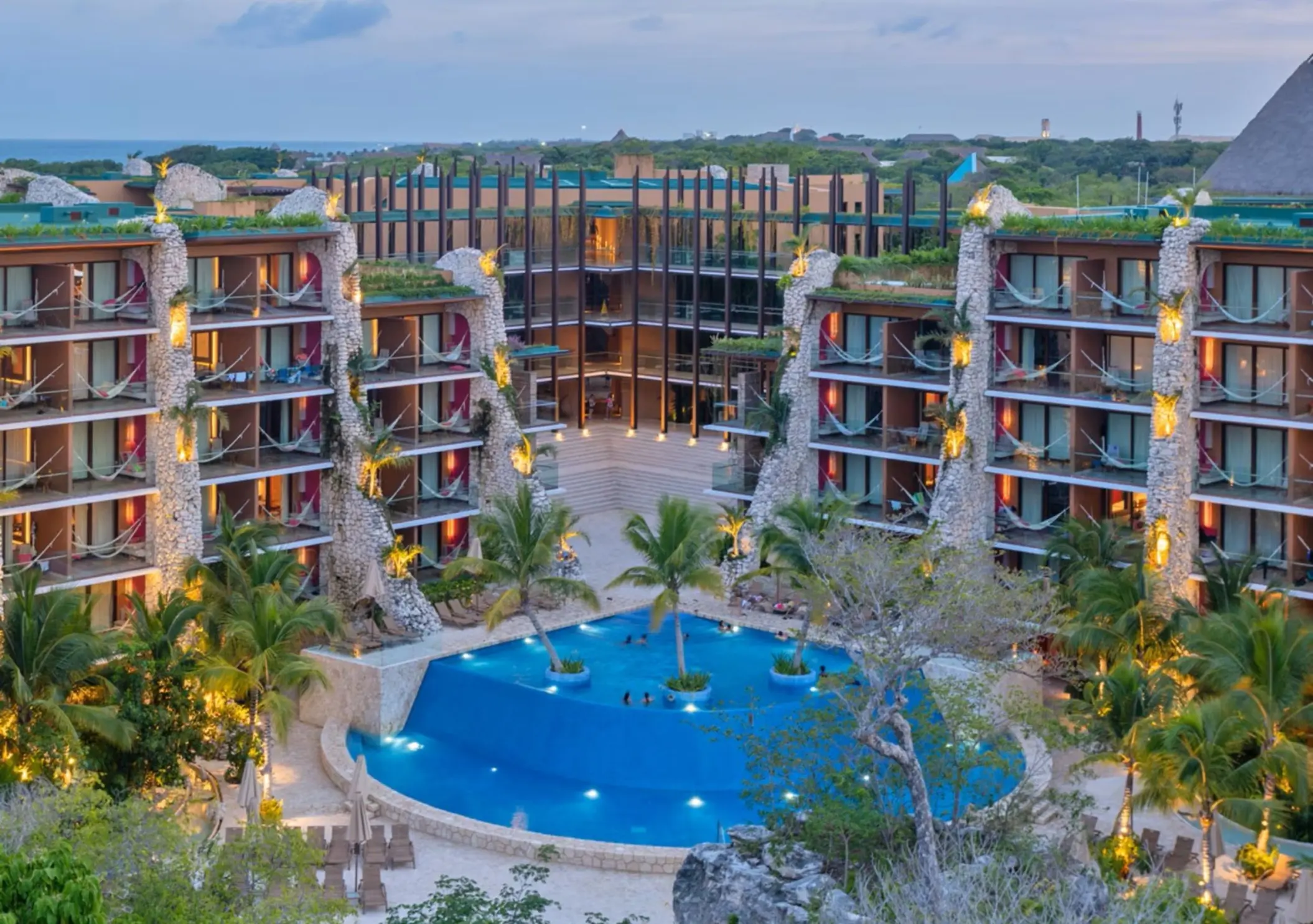 pool and accommodation buildings at Hotel Xcaret Mexico