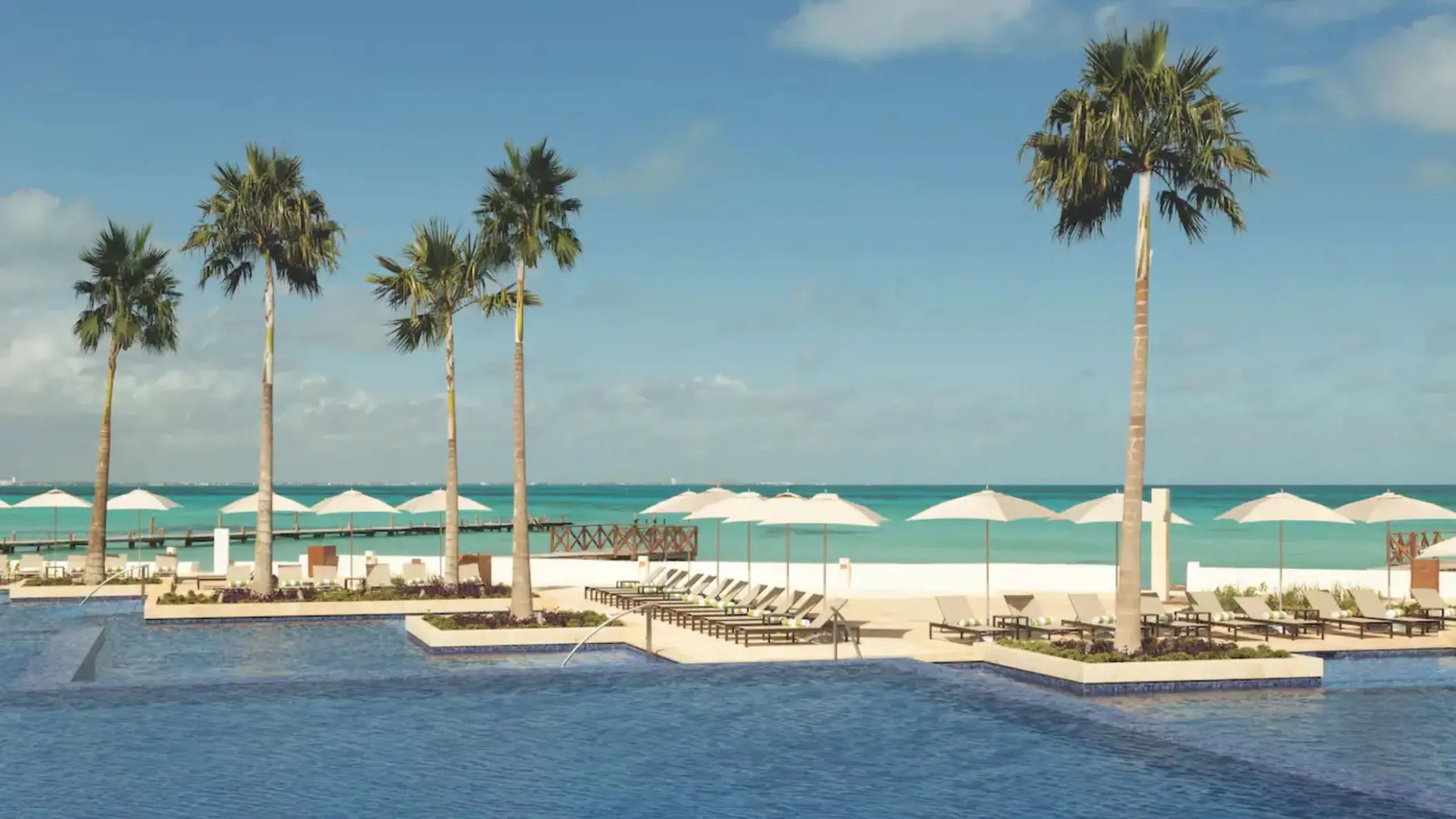 oceanfront pool with loungers at Hyatt Ziva Cancun
