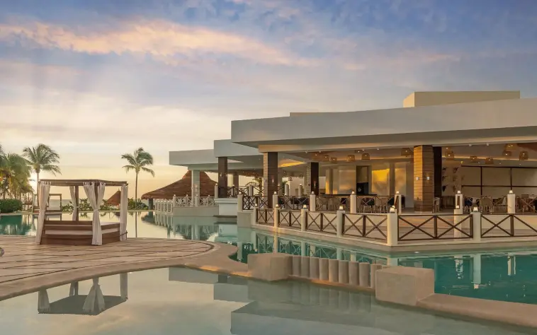 main pool during sunset at Hyatt Ziva Riviera Maya