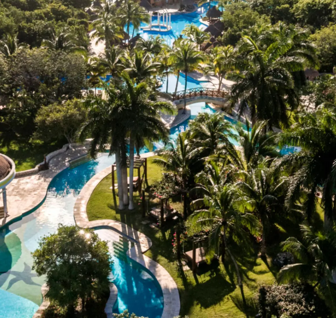 aerial view of the pools and tropical gardens at Iberostar Waves Paraiso del Mar