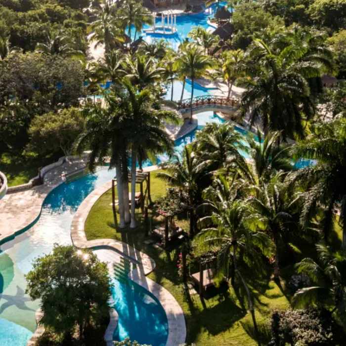 aerial view of the pools and tropical gardens at Iberostar Waves Paraiso del Mar