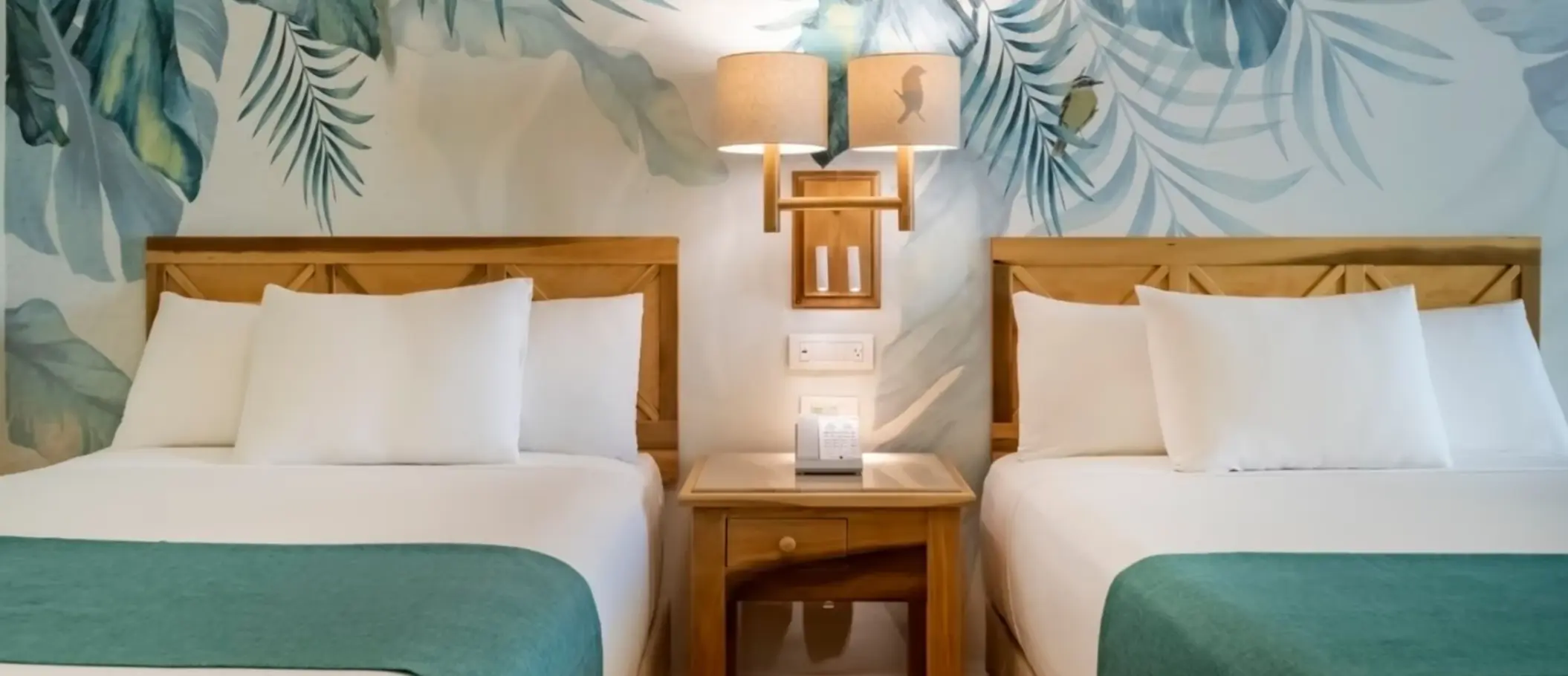 suite with two beds at Iberostar Selection Paraiso Lindo