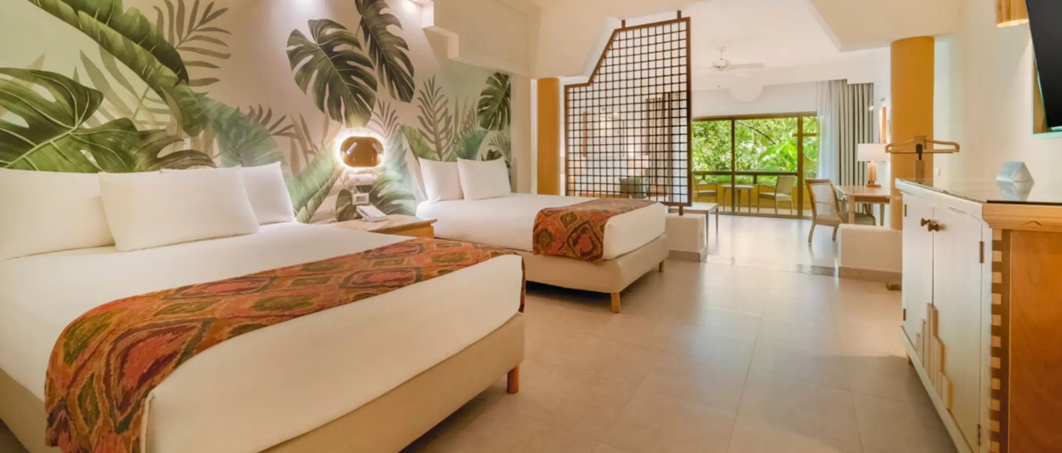 suite with two double beds at Iberostar Selection Paraiso Maya Suites