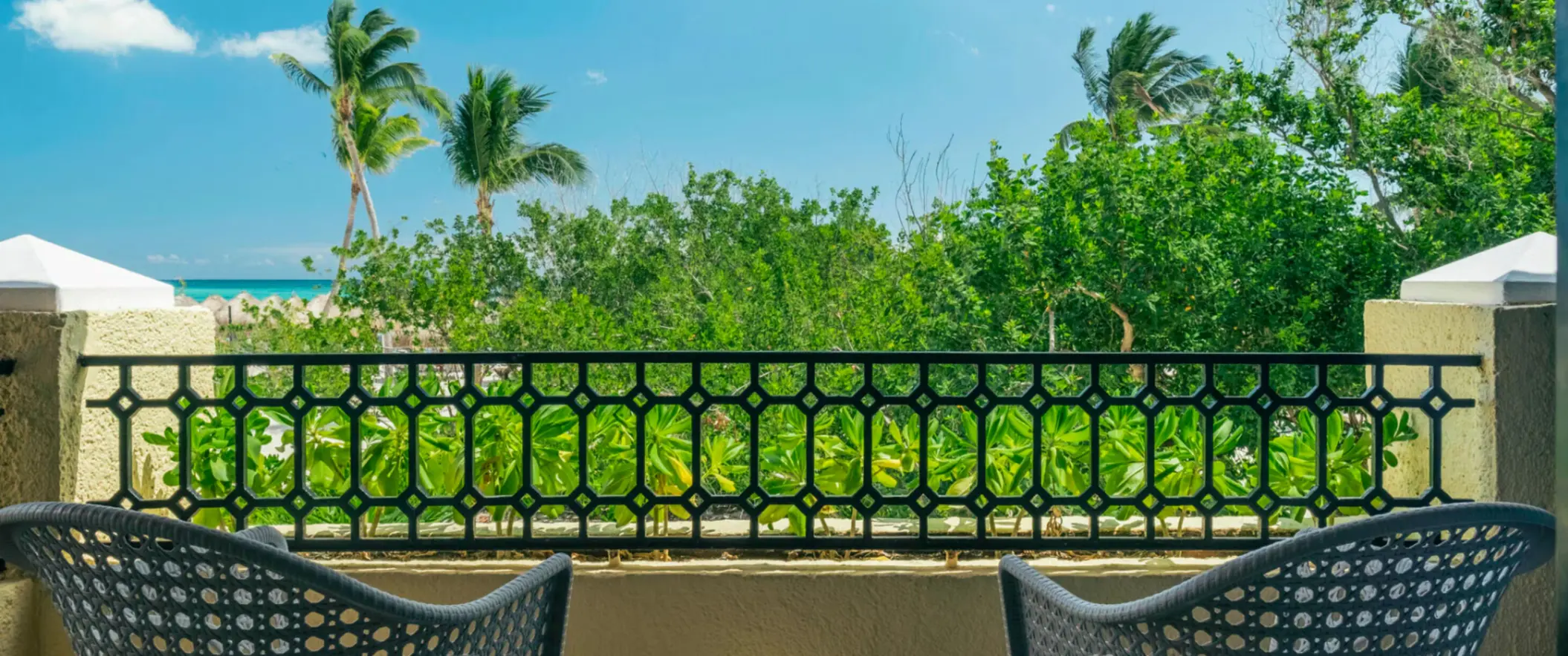 tropical view from the balcony of a suite at Iberostar Waves Paraiso Beach