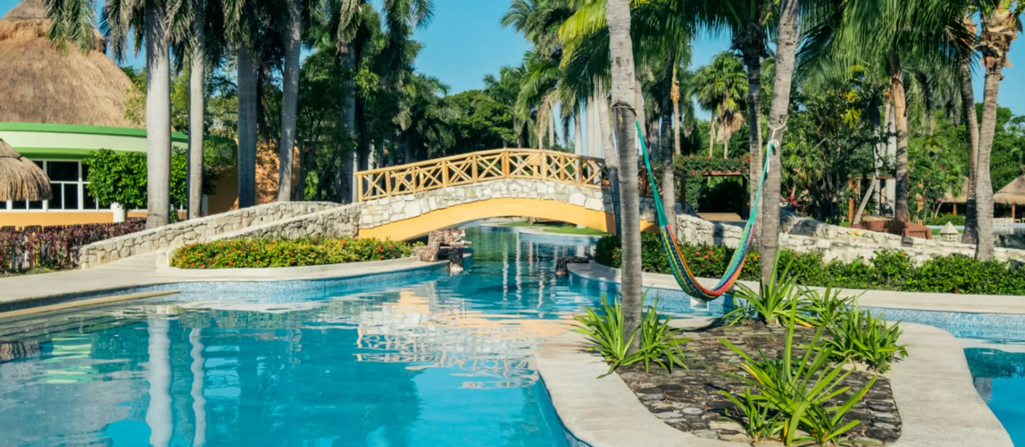 bridge over the pool at Iberostar Waves Paraiso Beach