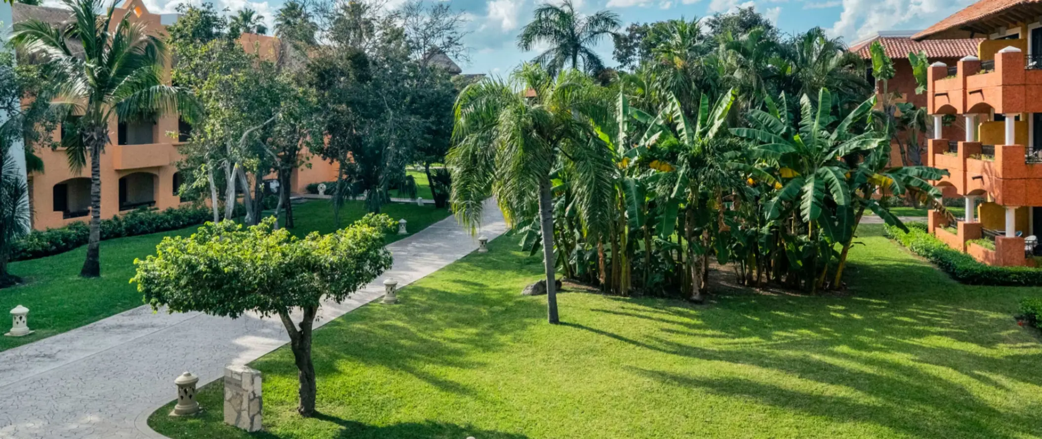lush gardens and pathways at Iberostar Waves Paraiso Beach